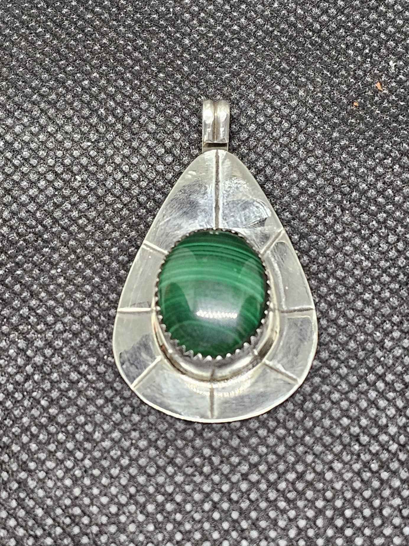 Sterling Silver Oval Malachite Pendant with Stamped Silver Surround