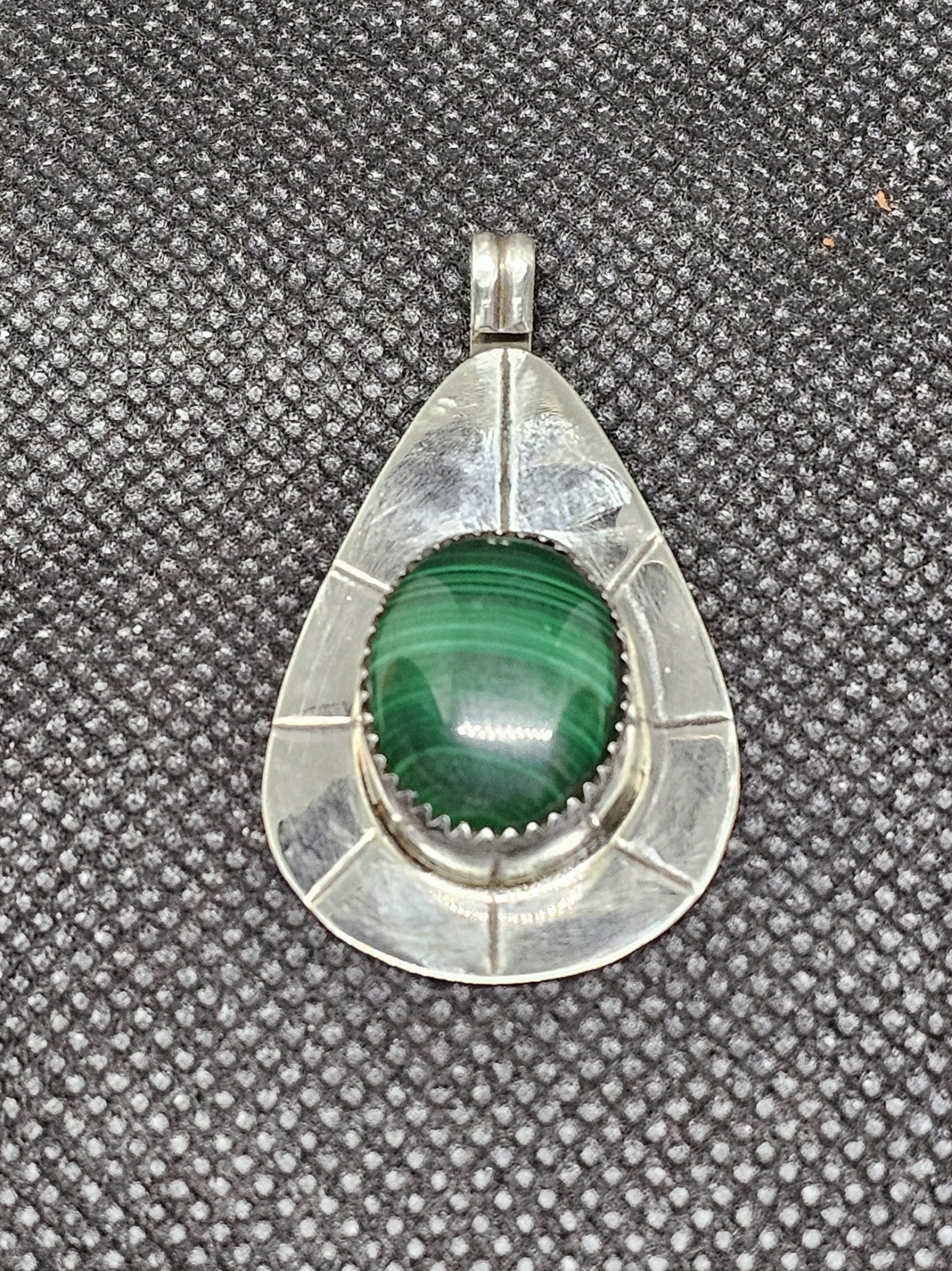 Sterling Silver Oval Malachite Pendant with Stamped Silver Surround